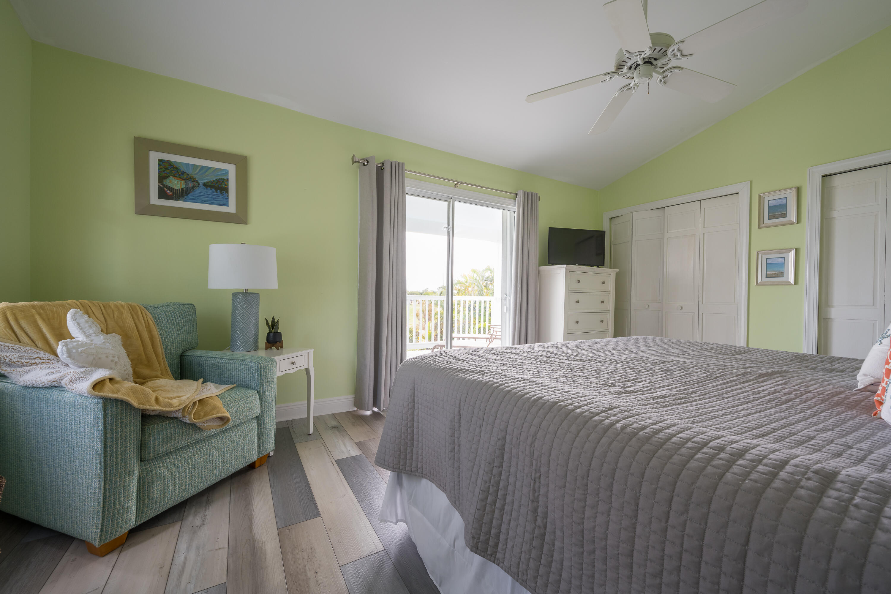 243 Golf Club Drive Key West, FL 33040 - Photo 35 of 54 a bedroom with a bed and window