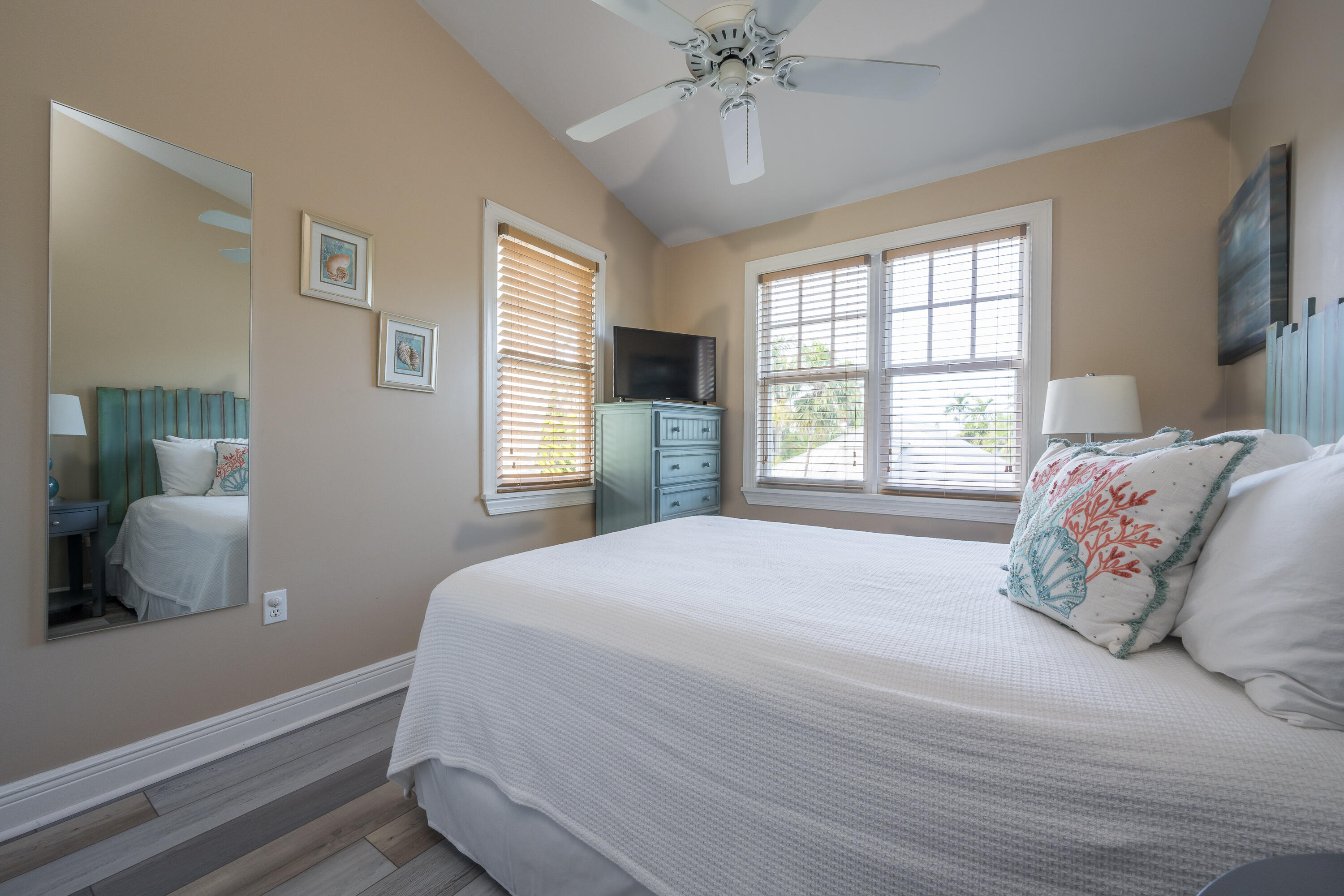 243 Golf Club Drive Key West, FL 33040 - Photo 36 of 54 a bedroom with a large bed and a window