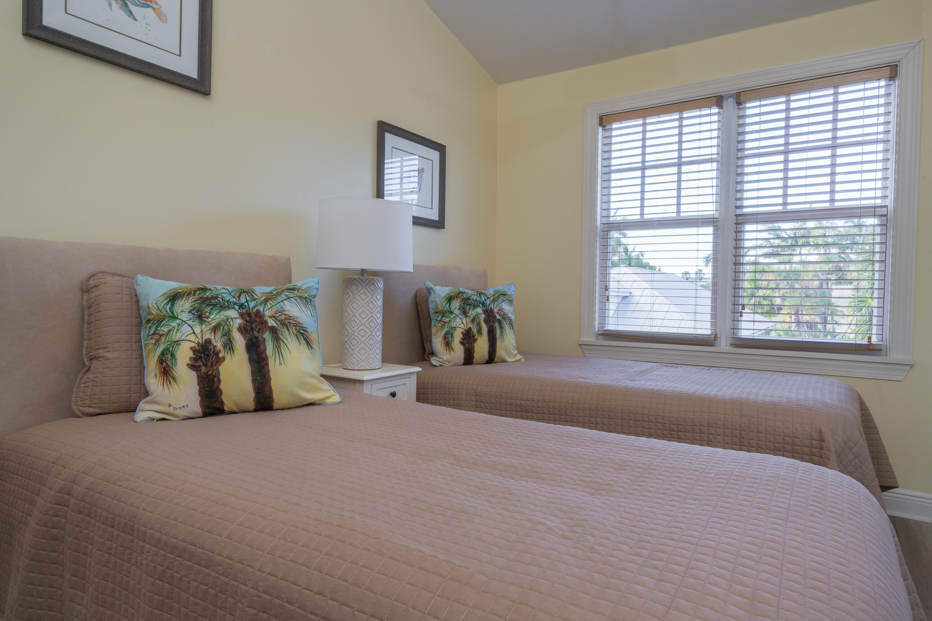 243 Golf Club Drive Key West, FL 33040 - Photo 40 of 54 a spacious bedroom with a bed and a window