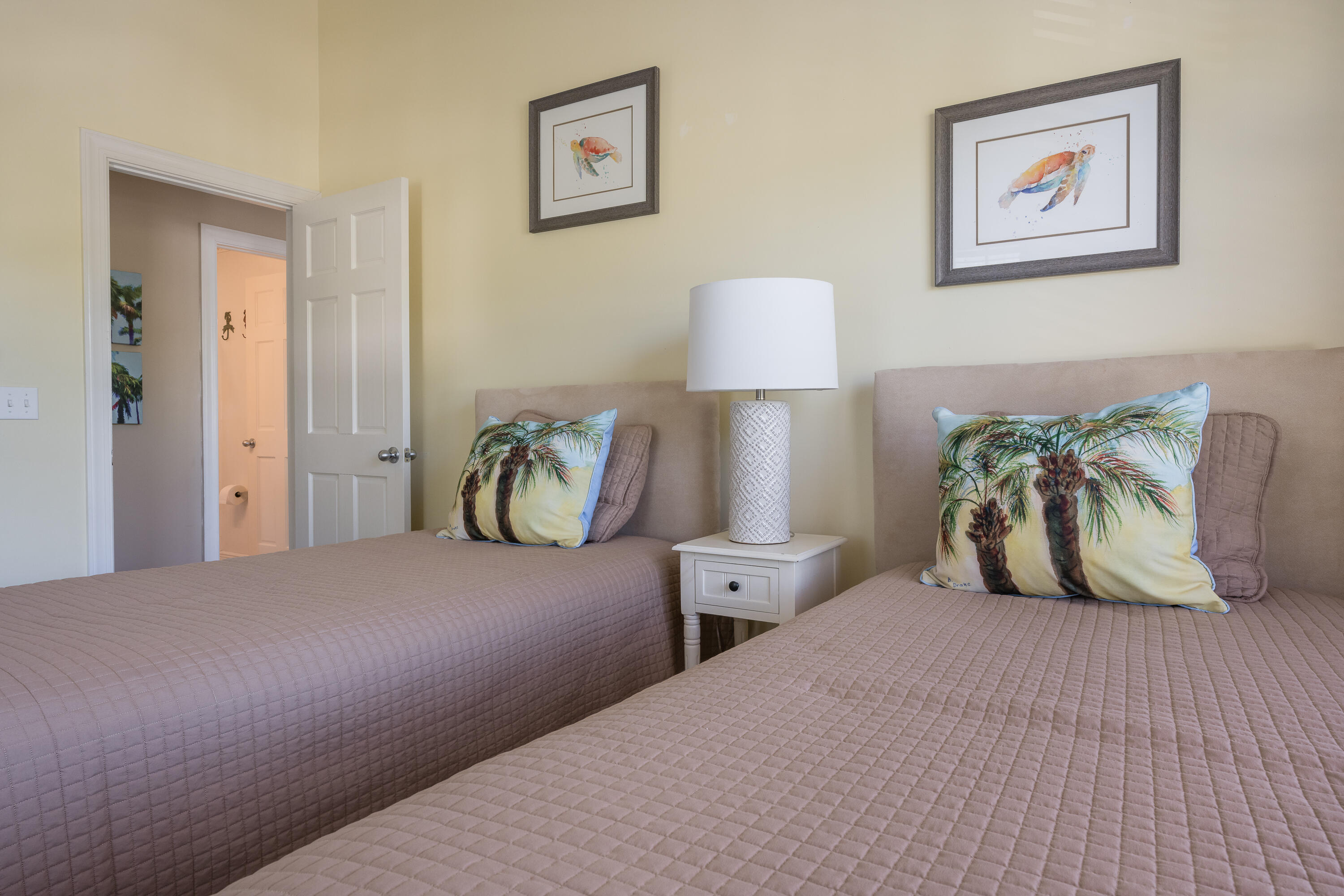 243 Golf Club Drive Key West, FL 33040 - Photo 41 of 54 a bedroom with a bed and painting on the wall