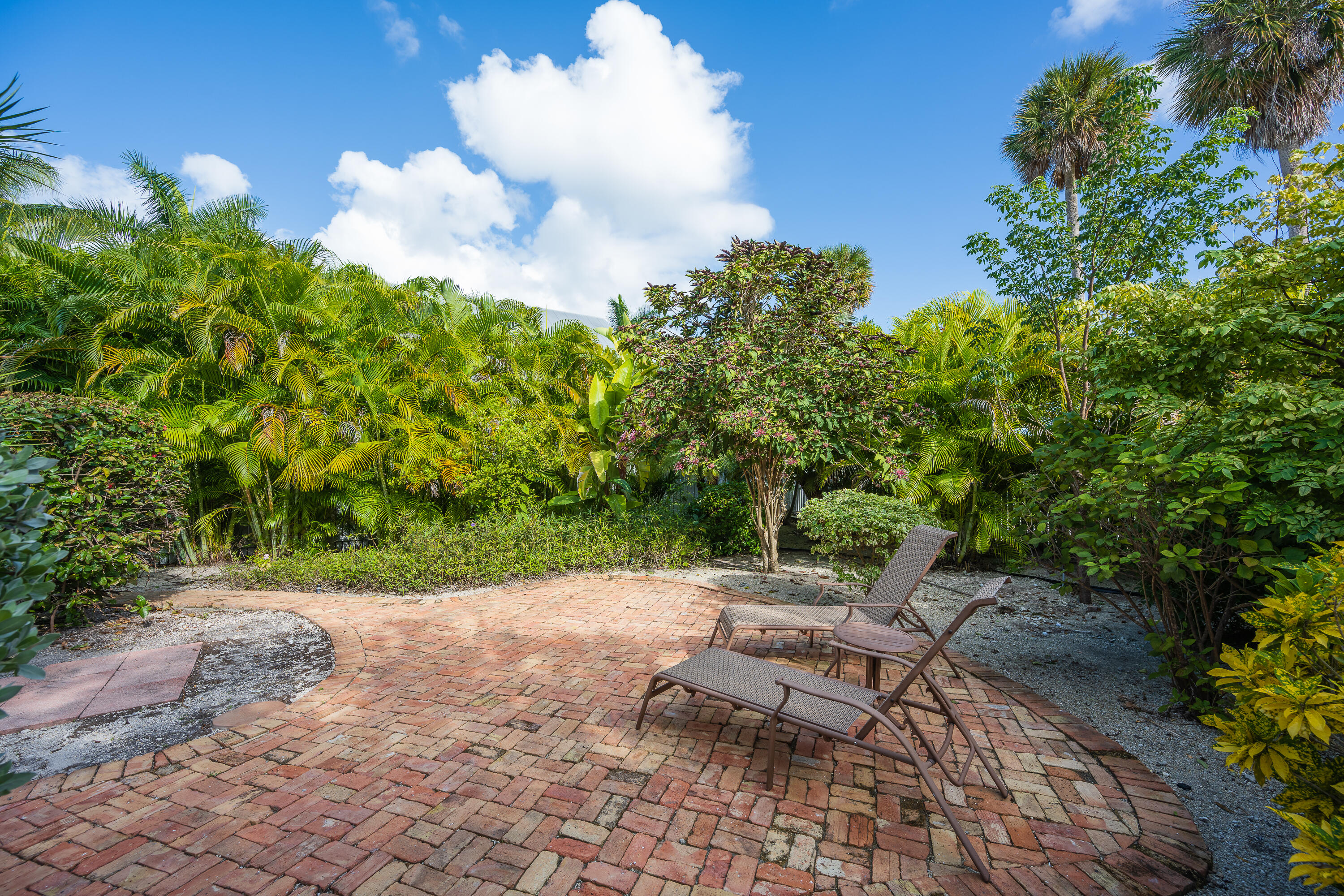 243 Golf Club Drive Key West, FL 33040 - Photo 45 of 54 a view of a backyard with sitting area
