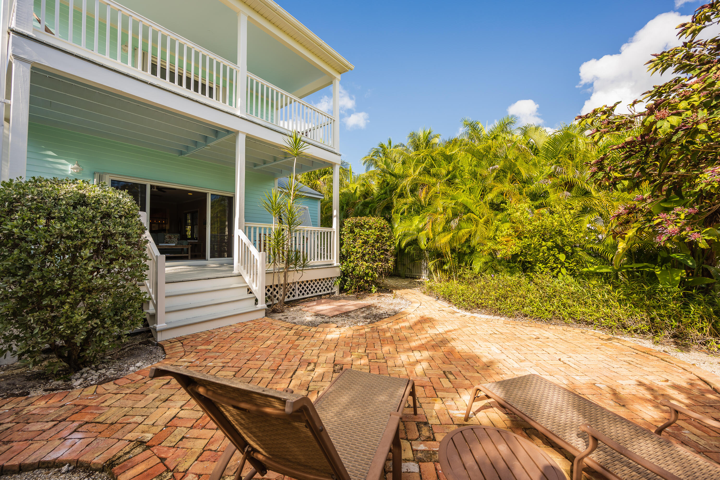 243 Golf Club Drive Key West, FL 33040 - Photo 46 of 54 a view of a house with a yard
