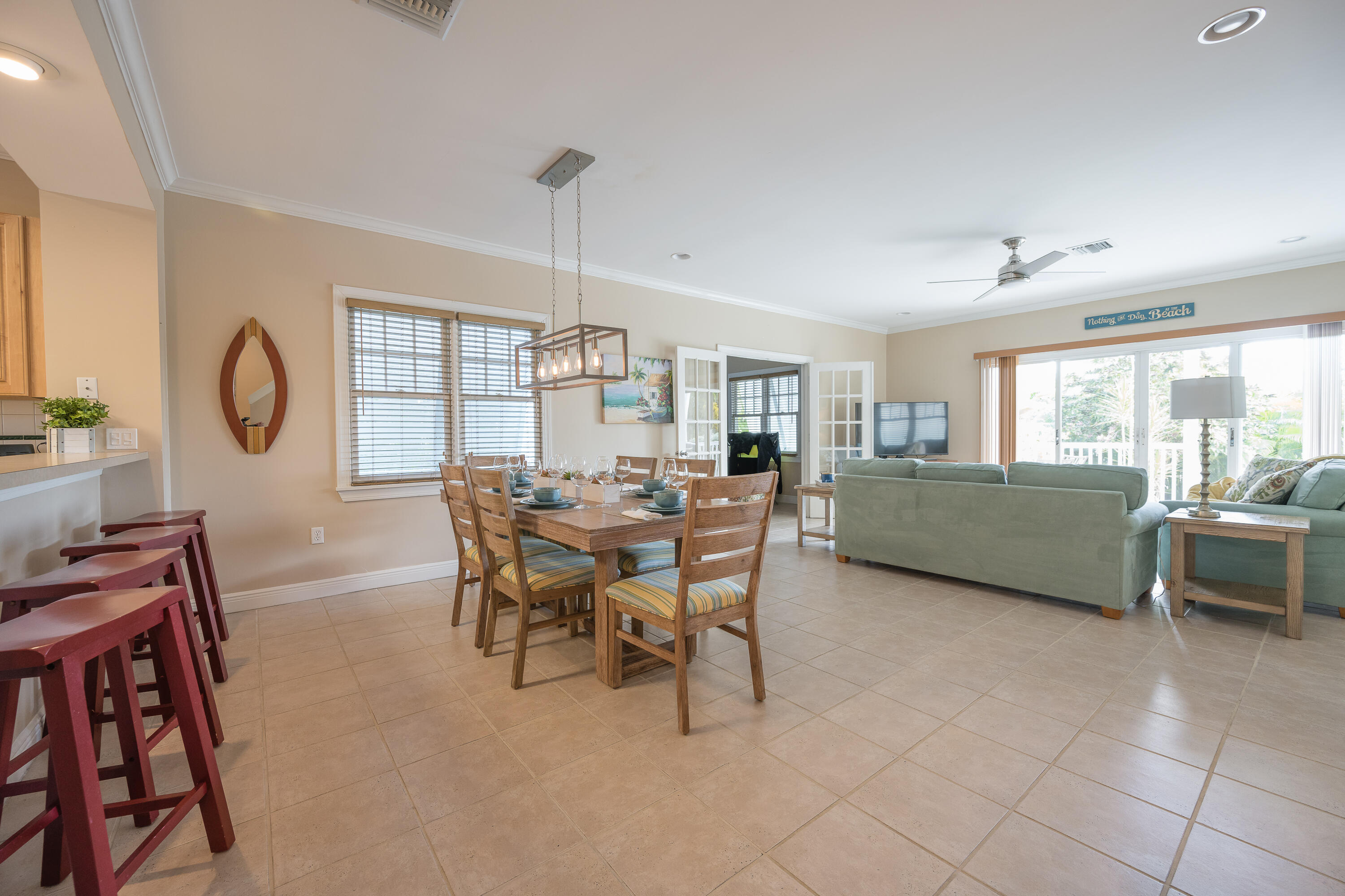 243 Golf Club Drive Key West, FL 33040 - Photo 8 of 54 a view of a dining room with furniture and a window