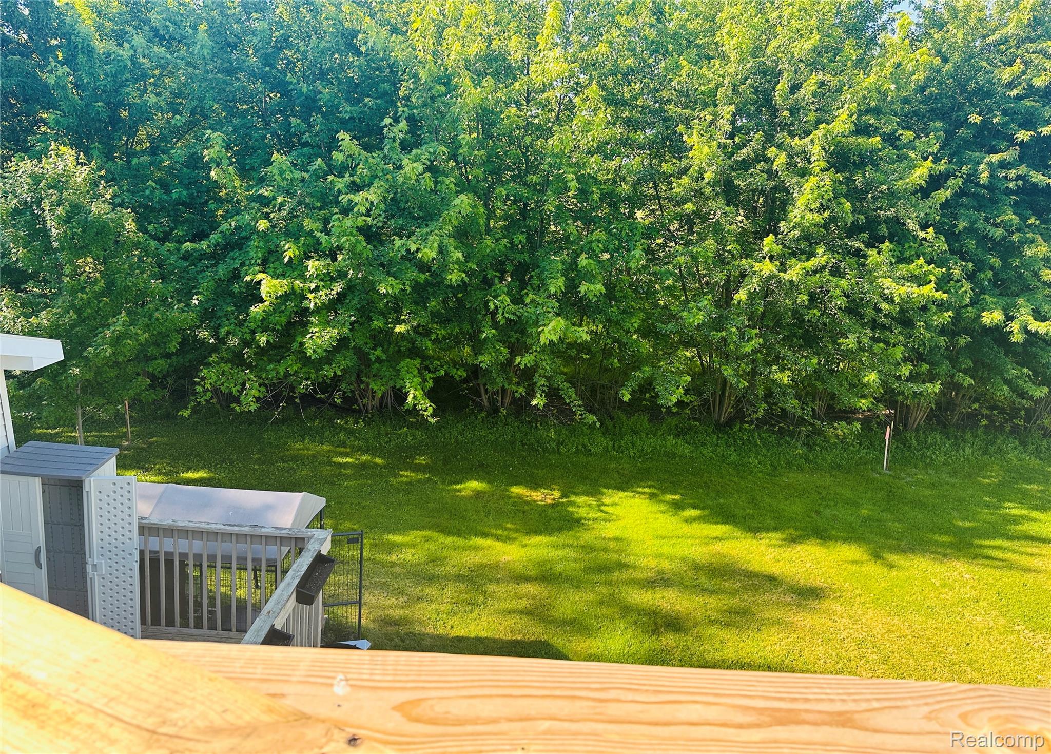 11270 Rushton Road, Unit 3 South Lyon, MI 48178 - Photo 5 of 21 11270 back from deck.jpg