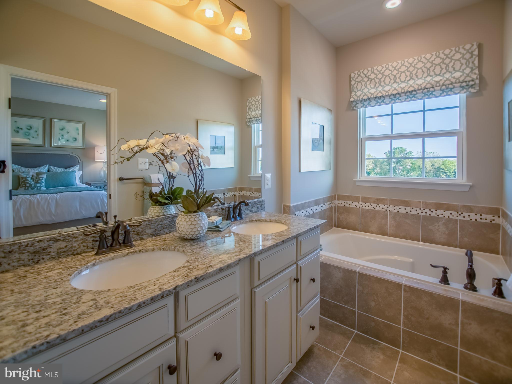 7834 Mine Run Road Hanover, MD 21076 - Photo 9 of 26 Owner's Bath Double Bowl Vanity and Soaking Tub