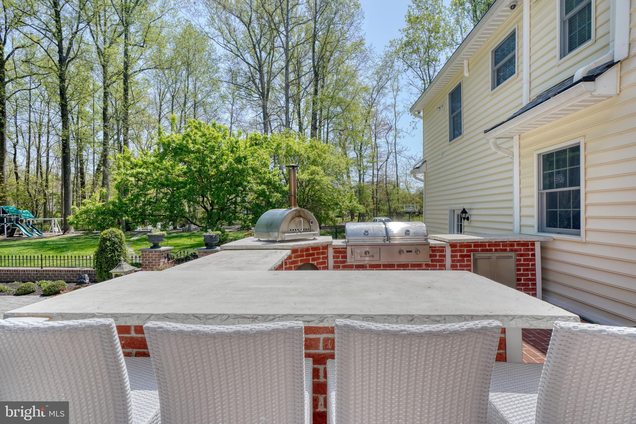 12907 Dover Road Reisterstown, MD 21136 - Photo 55 of 115 outdoor bar and pizza oven