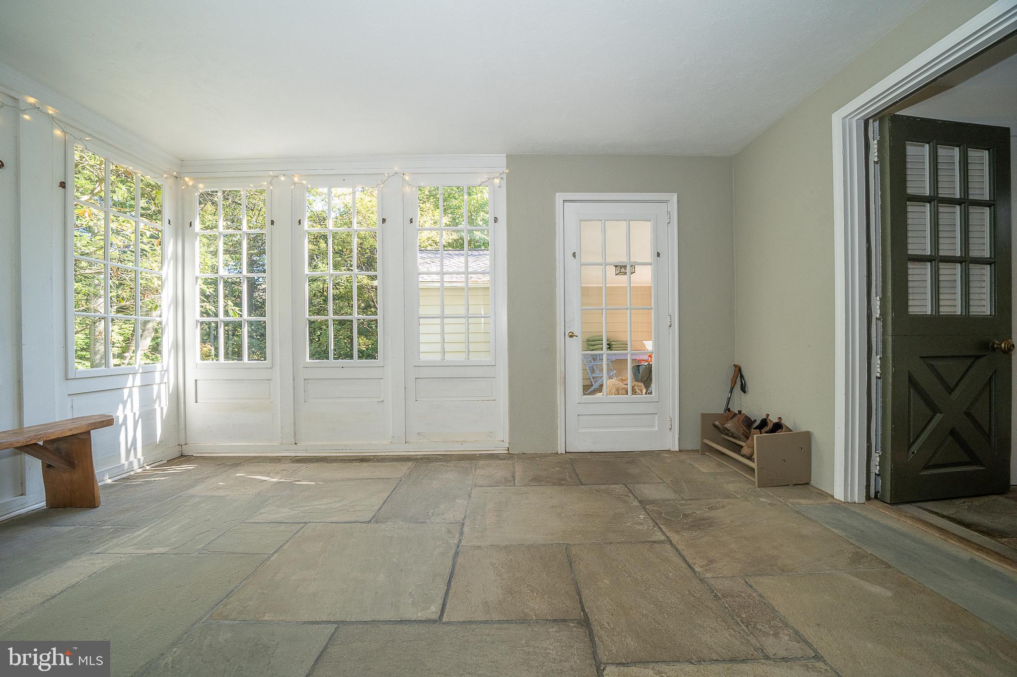 24-26 Paper Mill Road Newtown Square, PA 19073 - Photo 28 of 86 Enclosed porch functions as a mudroom