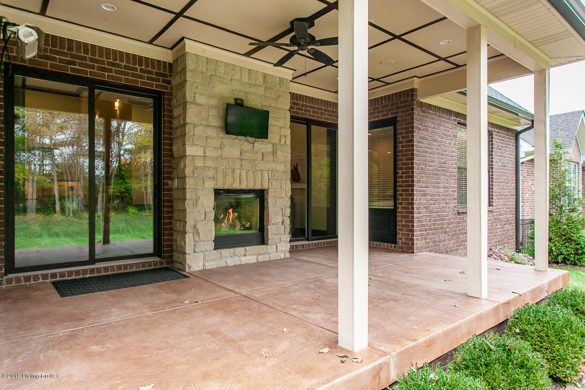 7815 Spring Farm Pointe Place Prospect, KY 40059 - Photo 36 of 44 See through fireplace on the back porch