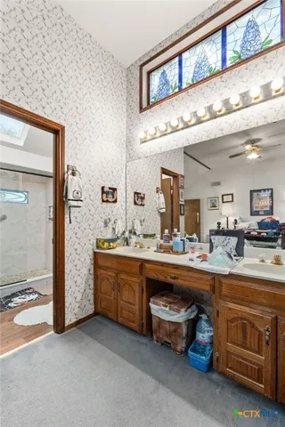 a living room with a couch and dresser