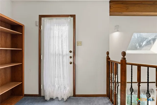 a view of a hallway with interior of the house