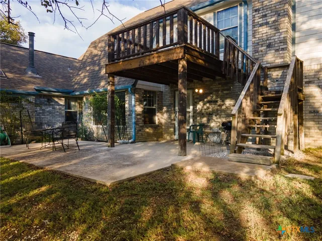 a view of a building with a patio