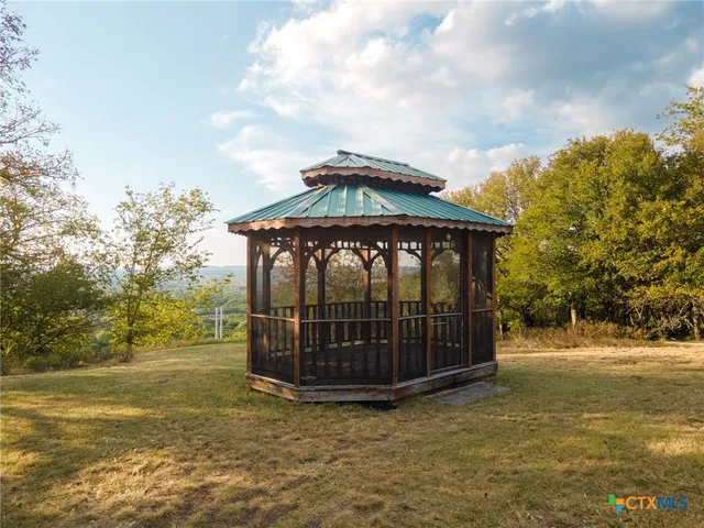 a view of a wooden floor with a big yard