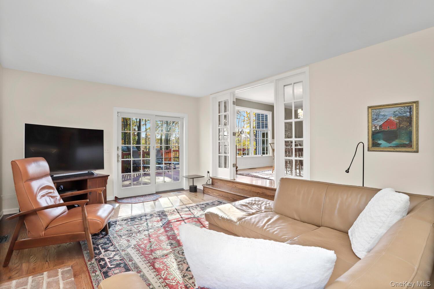 517 Old Chappaqua Road Briarcliff Manor, NY 10510 - Photo 12 of 32 Hardwood floors & door to Deck in Family Room
