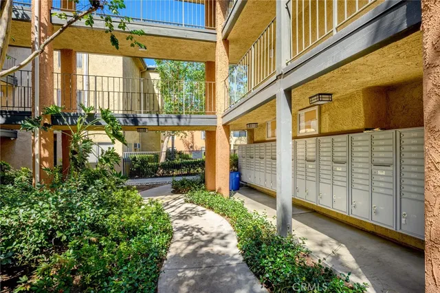 a view of a pathway along the building