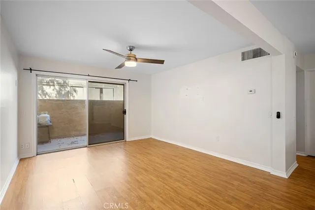 a view of wooden floor in an empty room