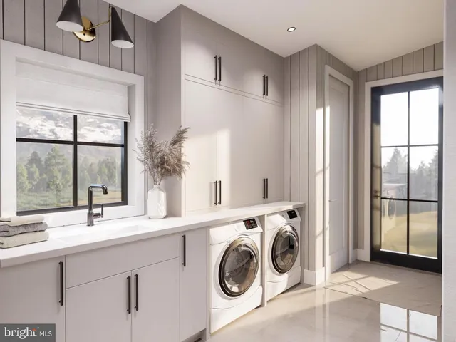 a bathroom with a sink and a large mirror