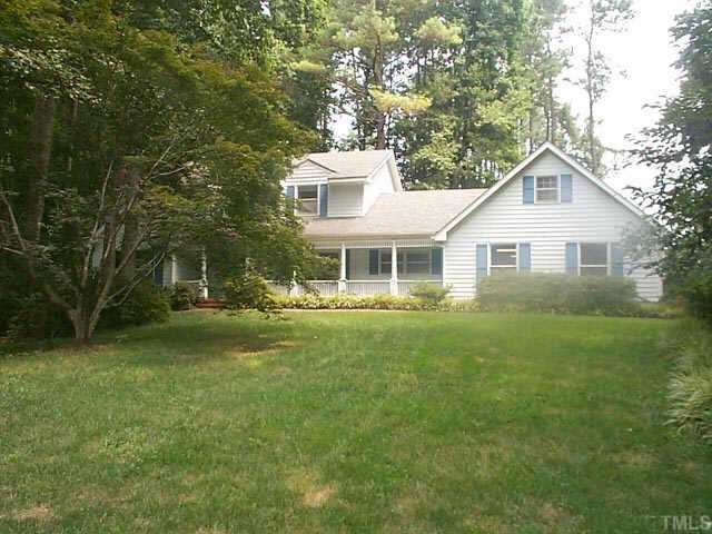 3004 Club Drive Raleigh, NC 27613 - Photo 1 of 1 a front view of a house with a garden