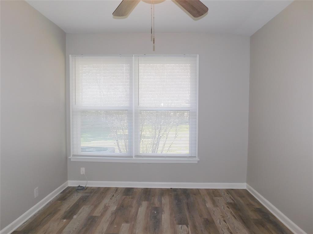 819 Thomas Street Denton, TX 76201 - Photo 23 of 33 an empty room with a window