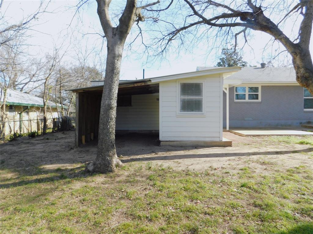 819 Thomas Street Denton, TX 76201 - Photo 30 of 33 a view of a house with a yard