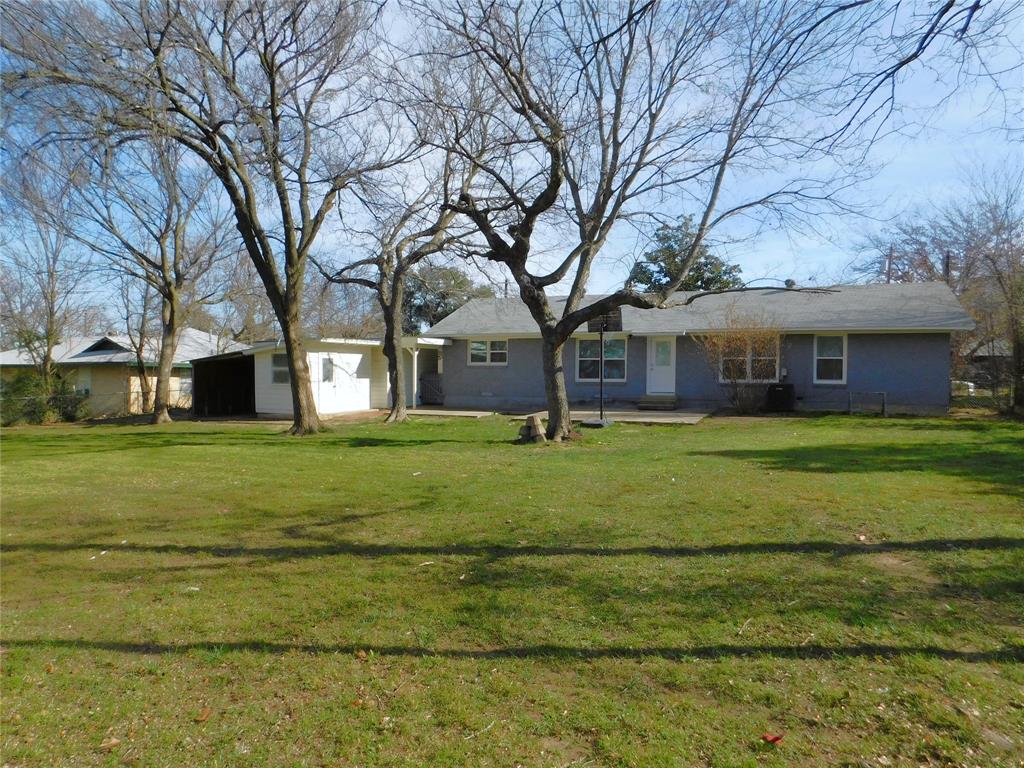 819 Thomas Street Denton, TX 76201 - Photo 33 of 33 a front view of a house with a yard