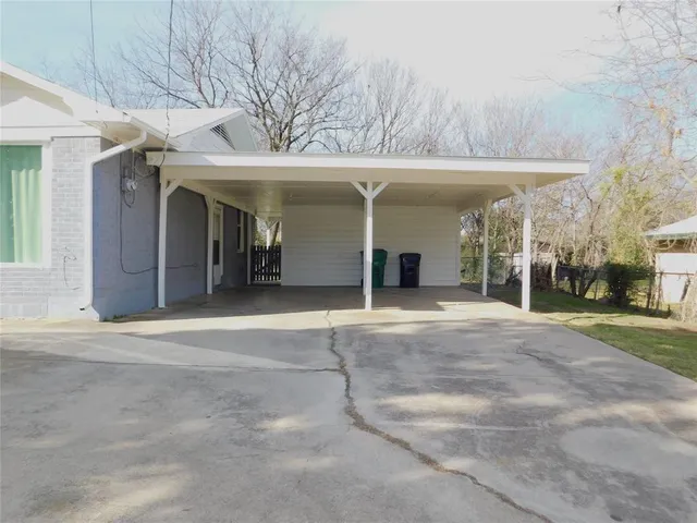 a view of a building with a garage