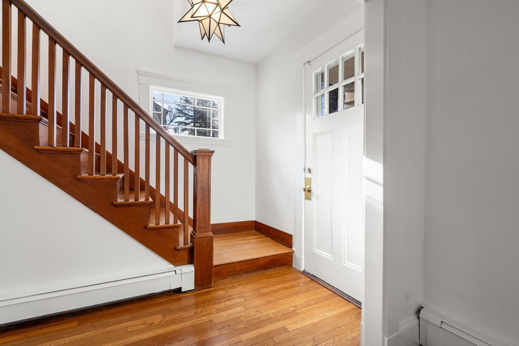 16 Intervale Road Wellesley, MA 02481 - Photo 13 of 24 a view of entryway and hall with wooden floor