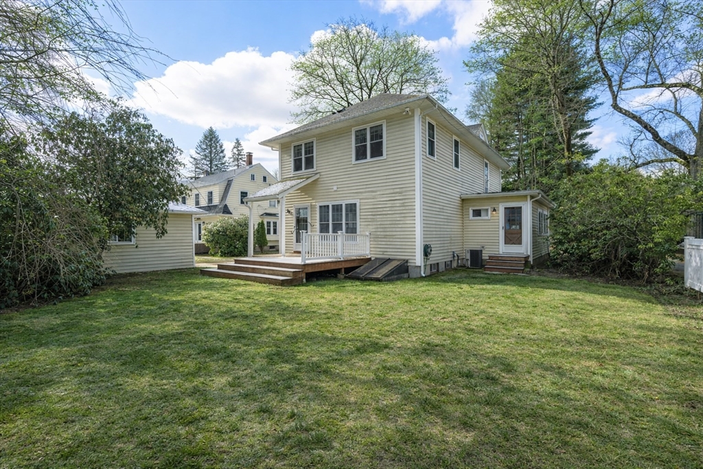 16 Intervale Road Wellesley, MA 02481 - Photo 2 of 24 a house view with a garden space
