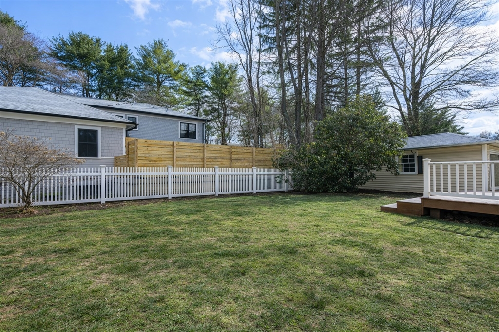 16 Intervale Road Wellesley, MA 02481 - Photo 22 of 24 front view of a house with a yard