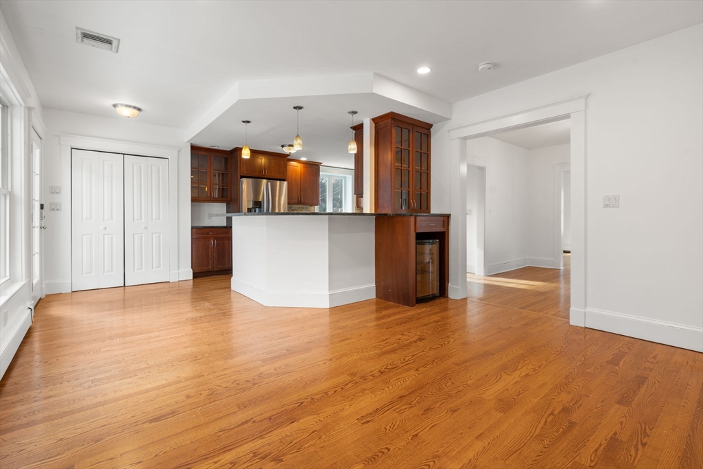 16 Intervale Road Wellesley, MA 02481 - Photo 9 of 24 a view of empty room with wooden floor