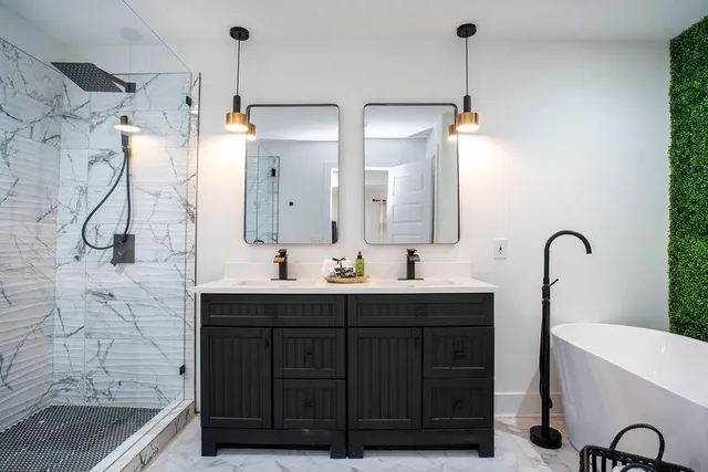 a bathroom with a sink and a mirror