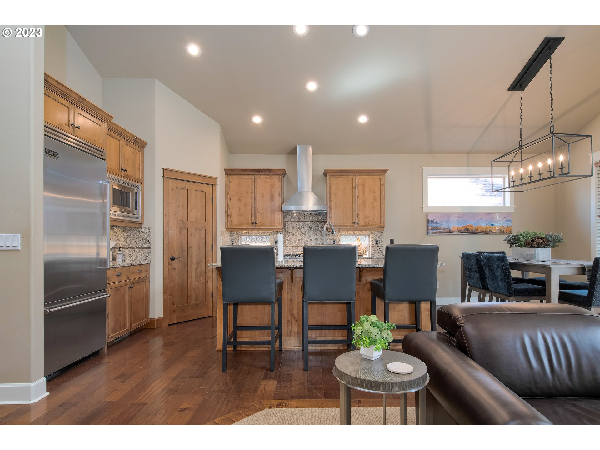 12918 Southwest Sevilla Avenue Portland, OR 97223 - Photo 12 of 44 a kitchen with a table and chairs