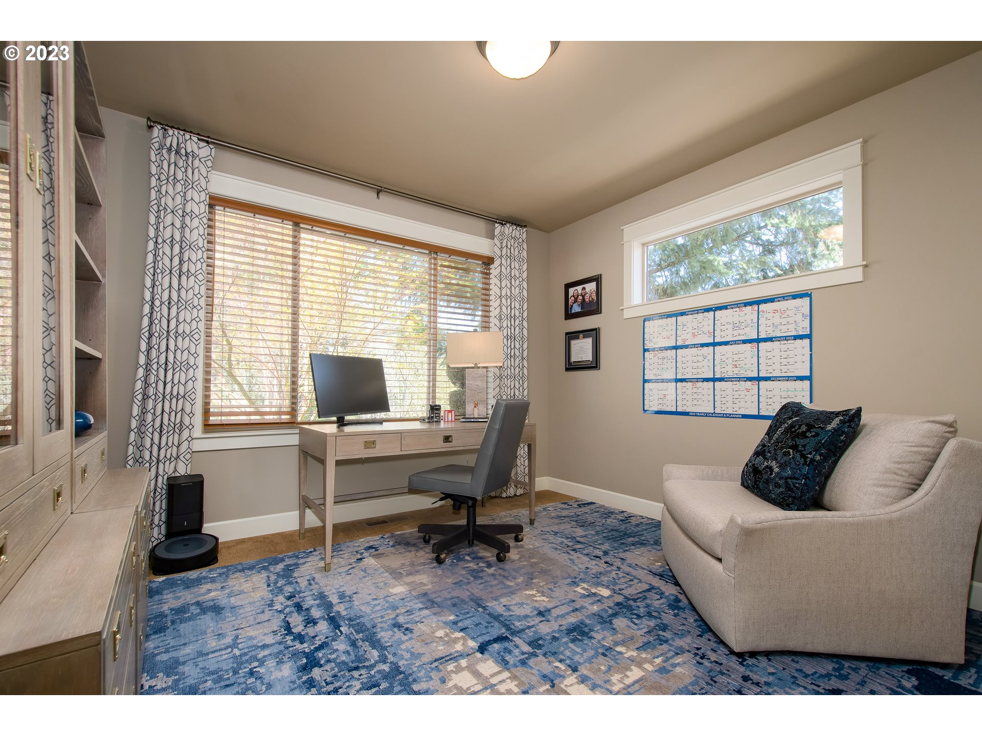 12918 Southwest Sevilla Avenue Portland, OR 97223 - Photo 28 of 44 a living room with furniture and a large window