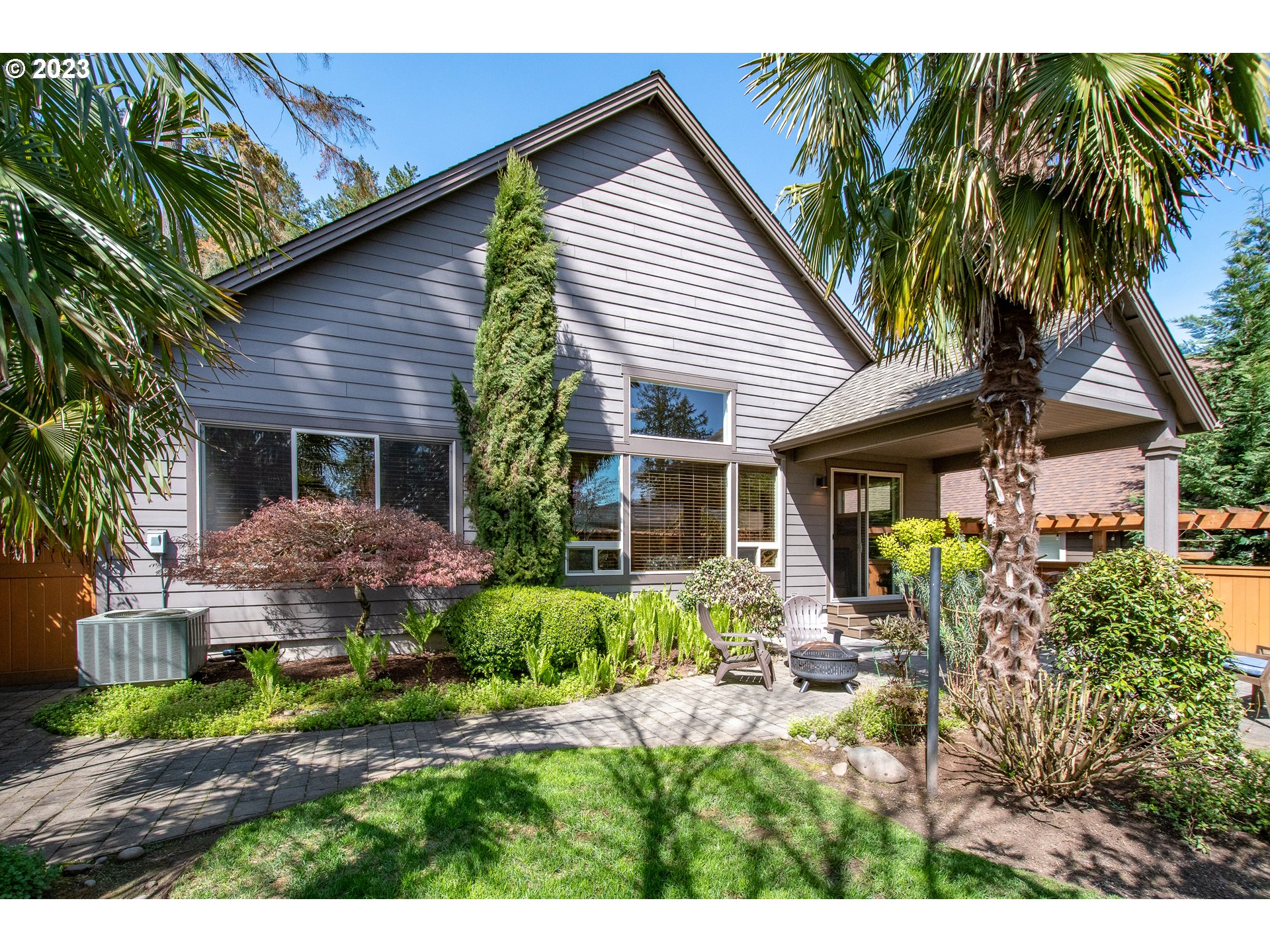 12918 Southwest Sevilla Avenue Portland, OR 97223 - Photo 38 of 44 a view of a house with a patio