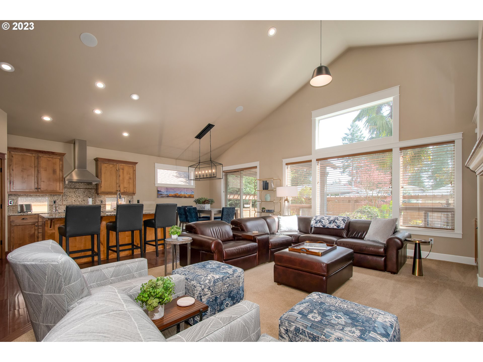12918 Southwest Sevilla Avenue Portland, OR 97223 - Photo 7 of 44 a living room with lots of furniture and a large window