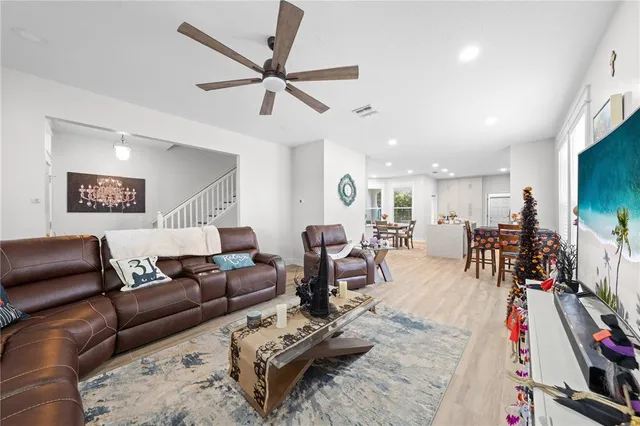 a living room with furniture and a window