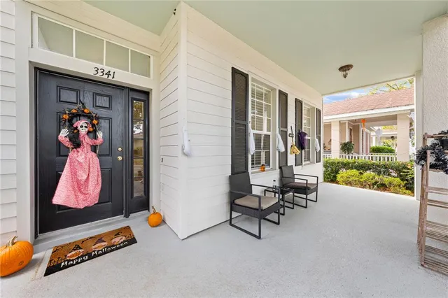 a kitchen with lots of counter top space a sink and appliances