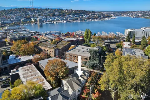 an aerial view of a houses with outdoor space