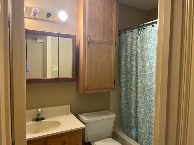 5949 Blakeview Place Bartlett, TN 38134 - Photo 14 of 15 a bathroom with a sink a toilet and shower