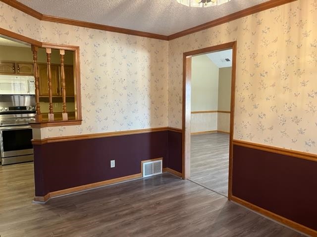 5949 Blakeview Place Bartlett, TN 38134 - Photo 8 of 15 en empty room with wooden floor and large window