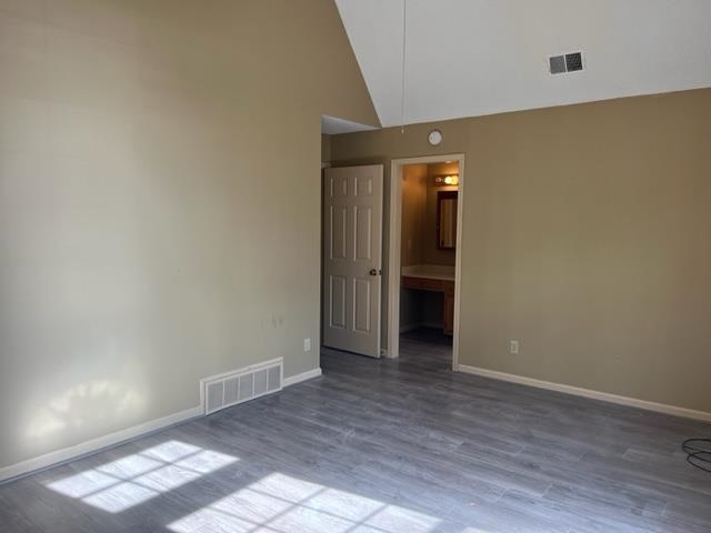 5949 Blakeview Place Bartlett, TN 38134 - Photo 10 of 15 an empty room with wooden floor and natural light