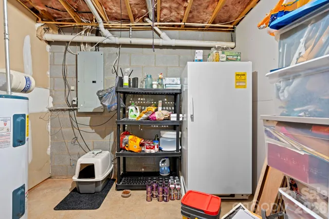 a view of a table and chairs in backyard