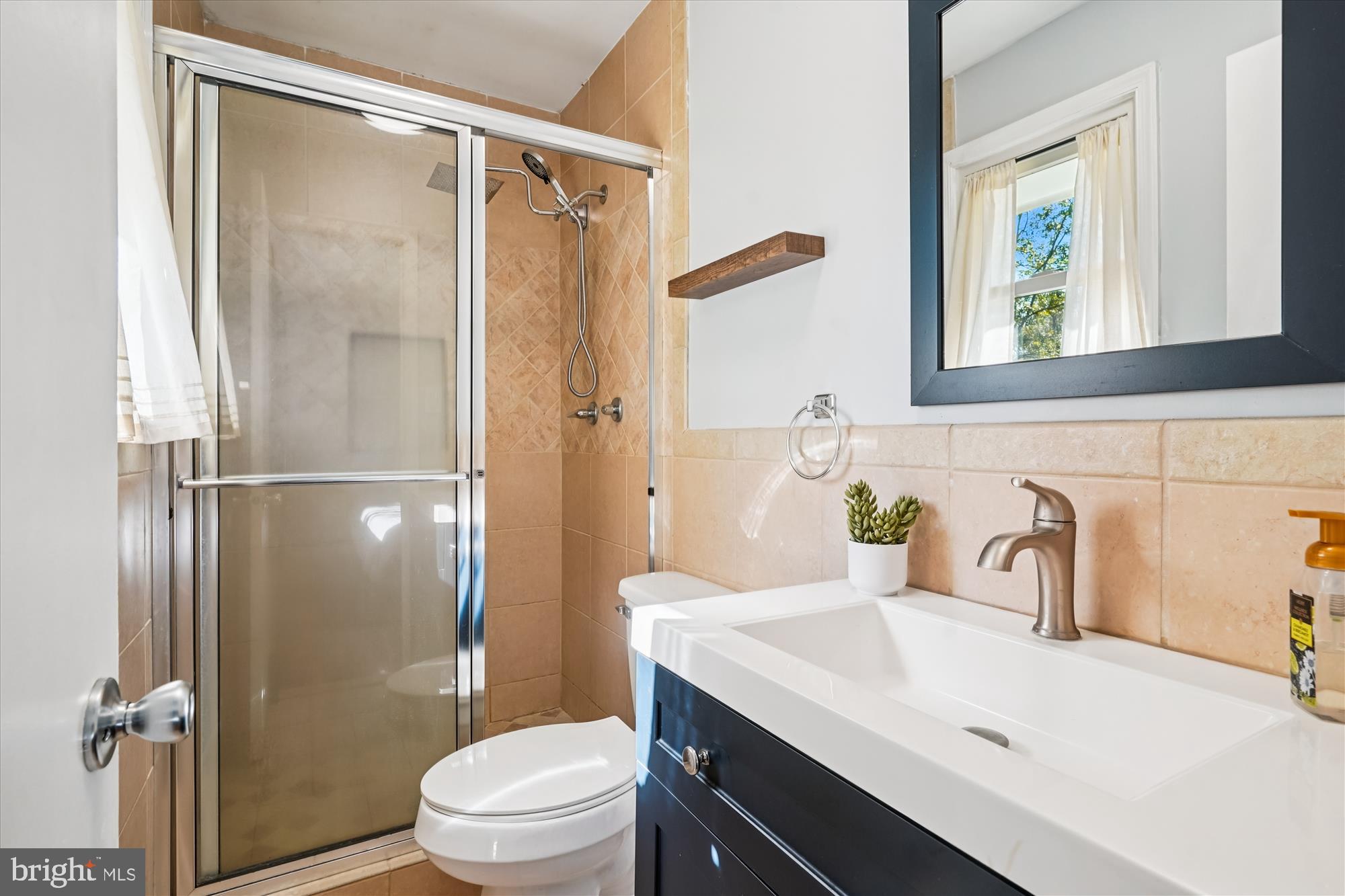 138 Courthouse Road Stafford, VA 22554 - Photo 10 of 29 a bathroom with a sink a toilet and shower