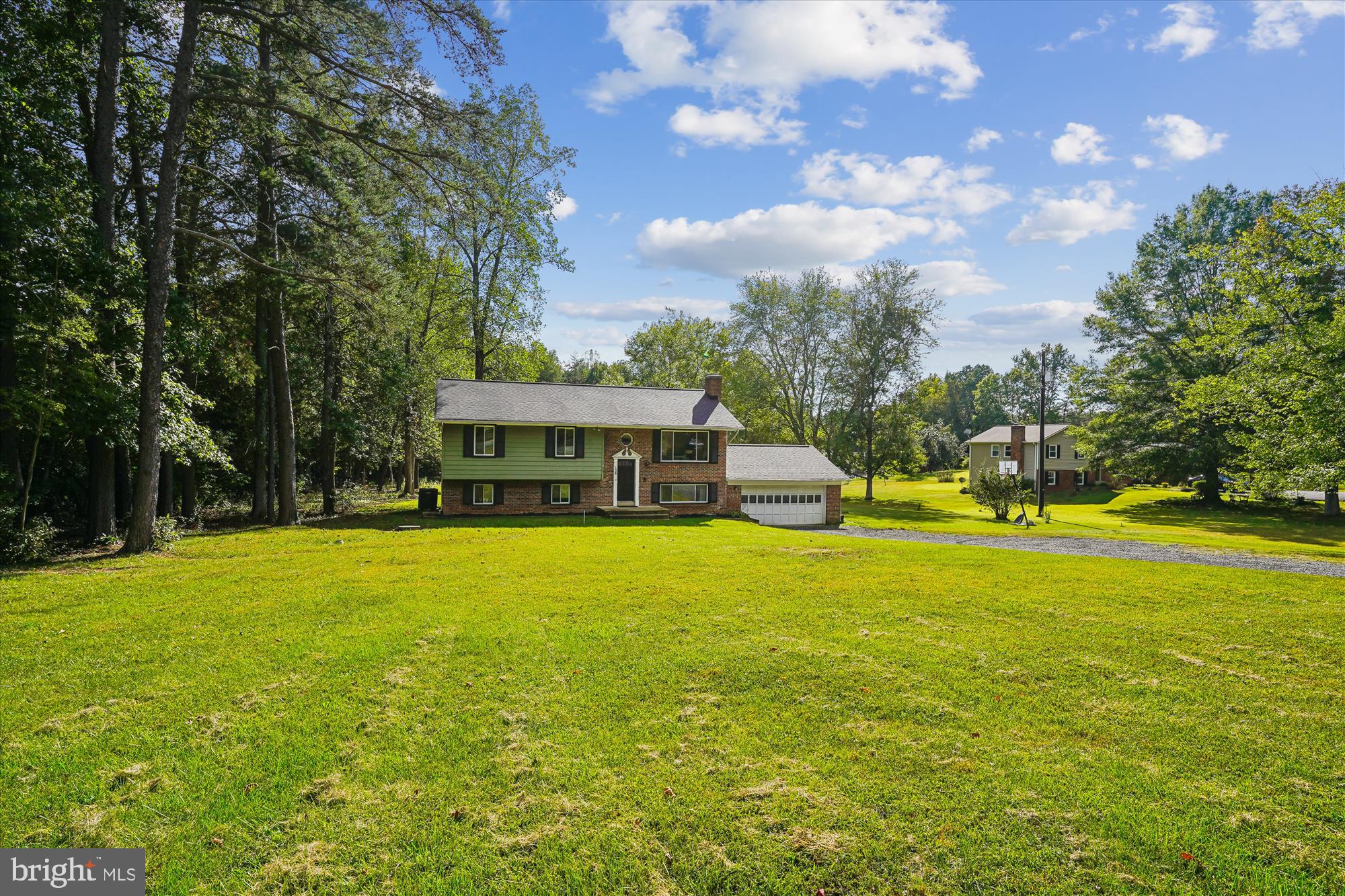 138 Courthouse Road Stafford, VA 22554 - Photo 28 of 29 a front view of house with yard and trees