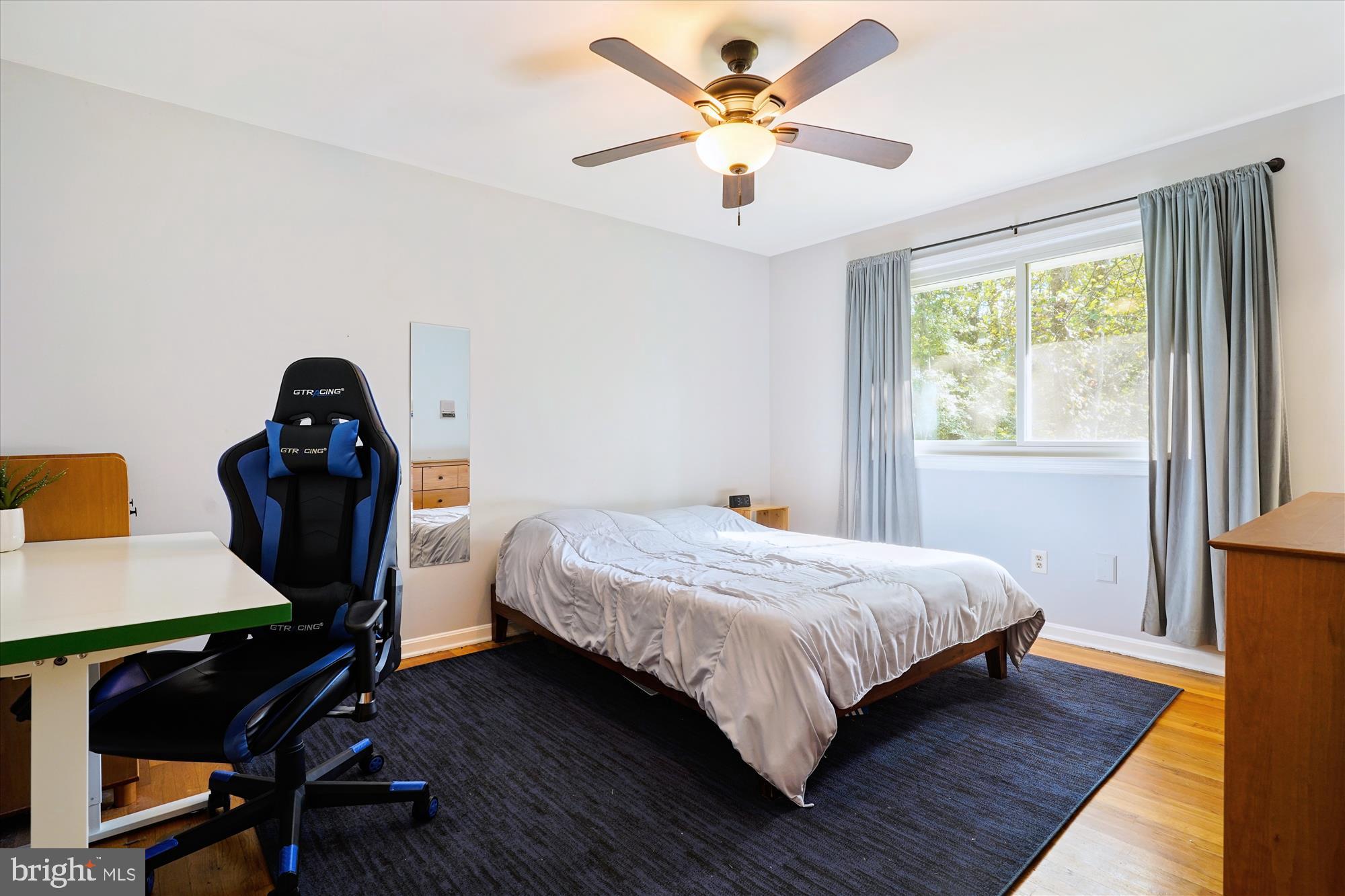 138 Courthouse Road Stafford, VA 22554 - Photo 9 of 29 a bedroom with a bed a desk and chair