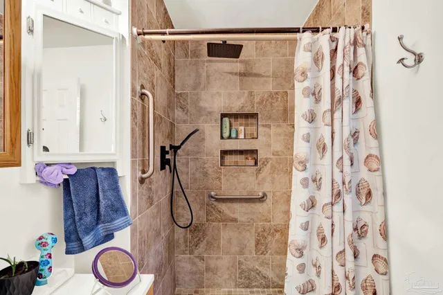 a bathroom with a shower curtain
