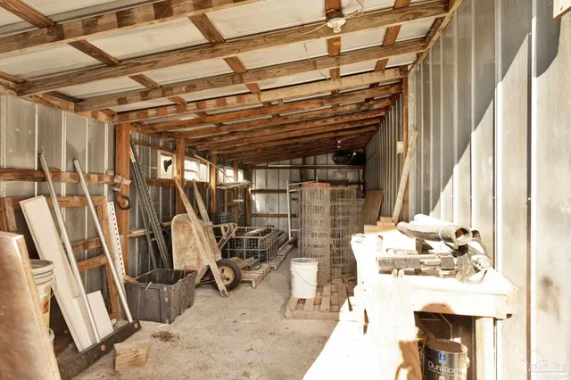 a view of a house with backyard and entertaining space