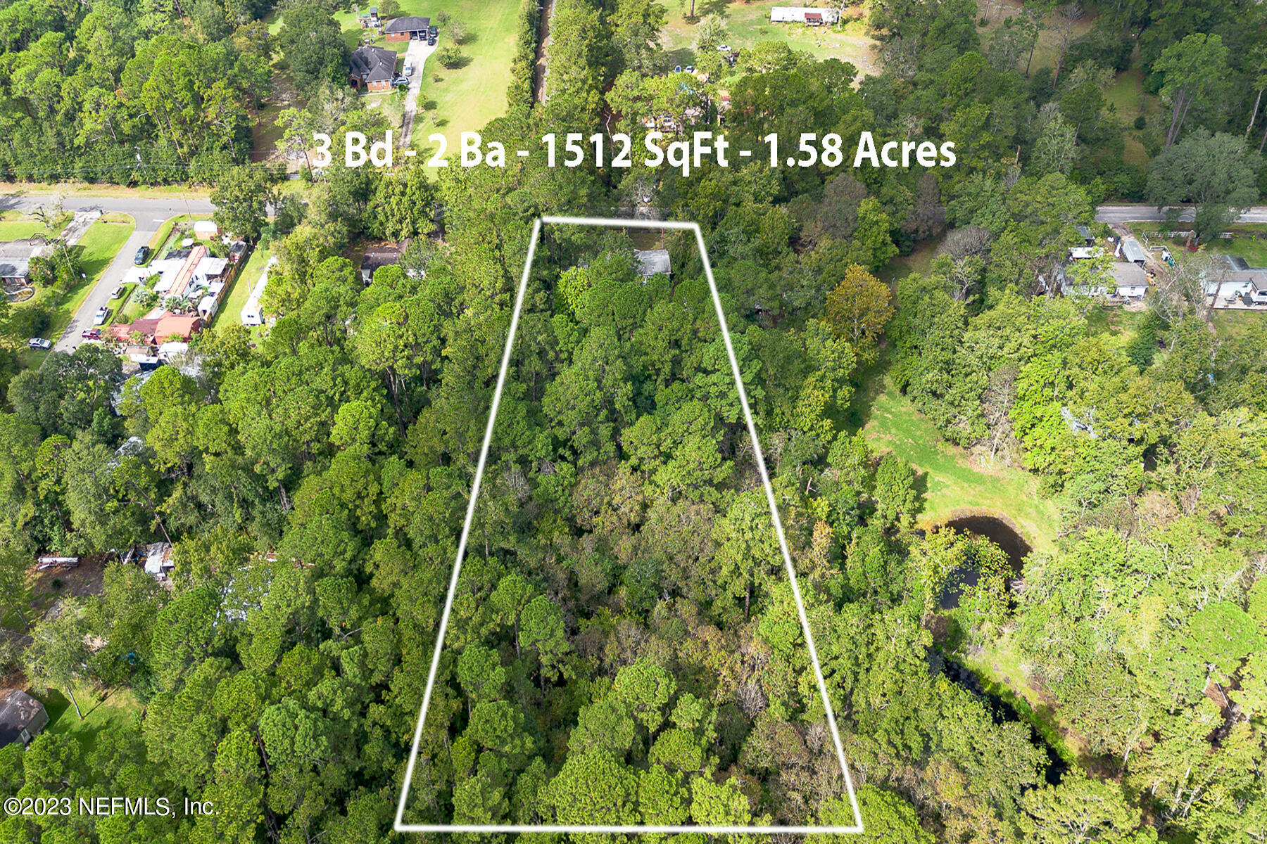 4671 Monroe Smith Road Jacksonville, FL 32210 - Photo 26 of 29 Ext Lot Rear (2)