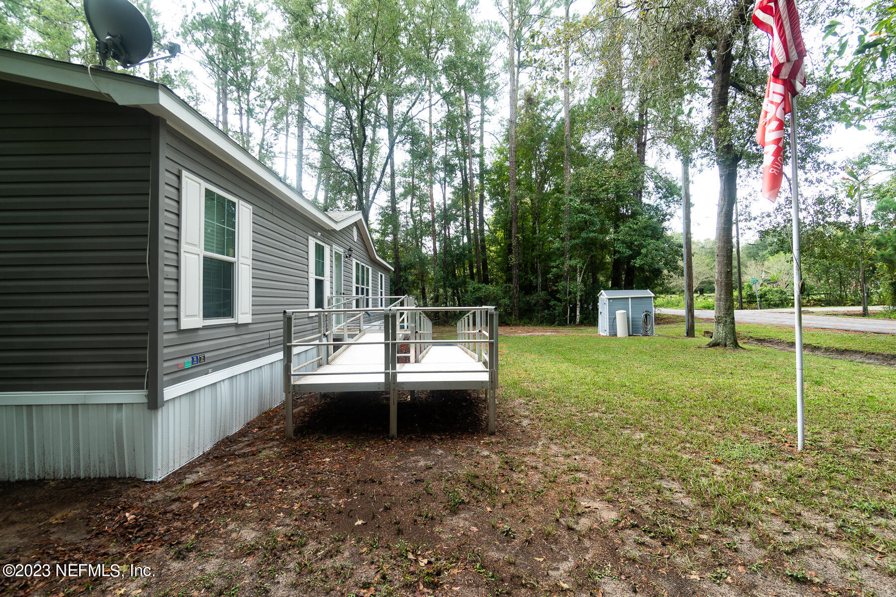 4671 Monroe Smith Road Jacksonville, FL 32210 - Photo 5 of 29 Ext Front Yard (1)