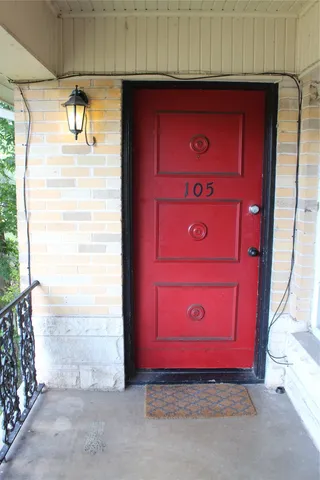 a view of a red door and small space