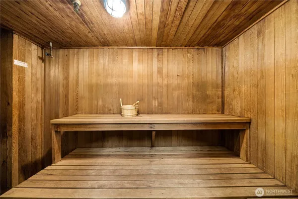 a view of a room with table and chairs